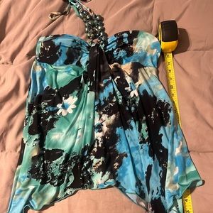 Beachy beaded halter top with pointed hem